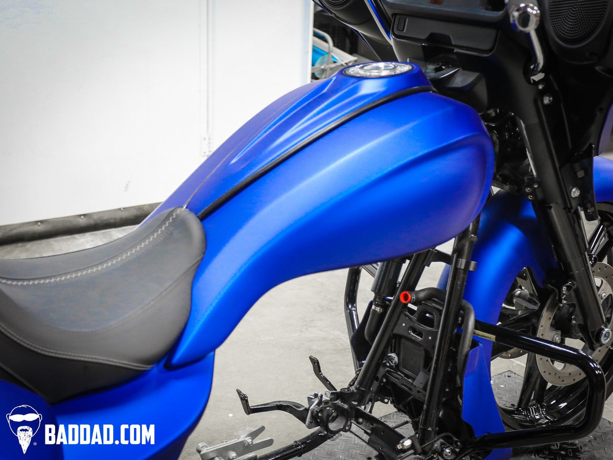 Close-up of painted Vantage Series stretched tank shroud flowing into the seat