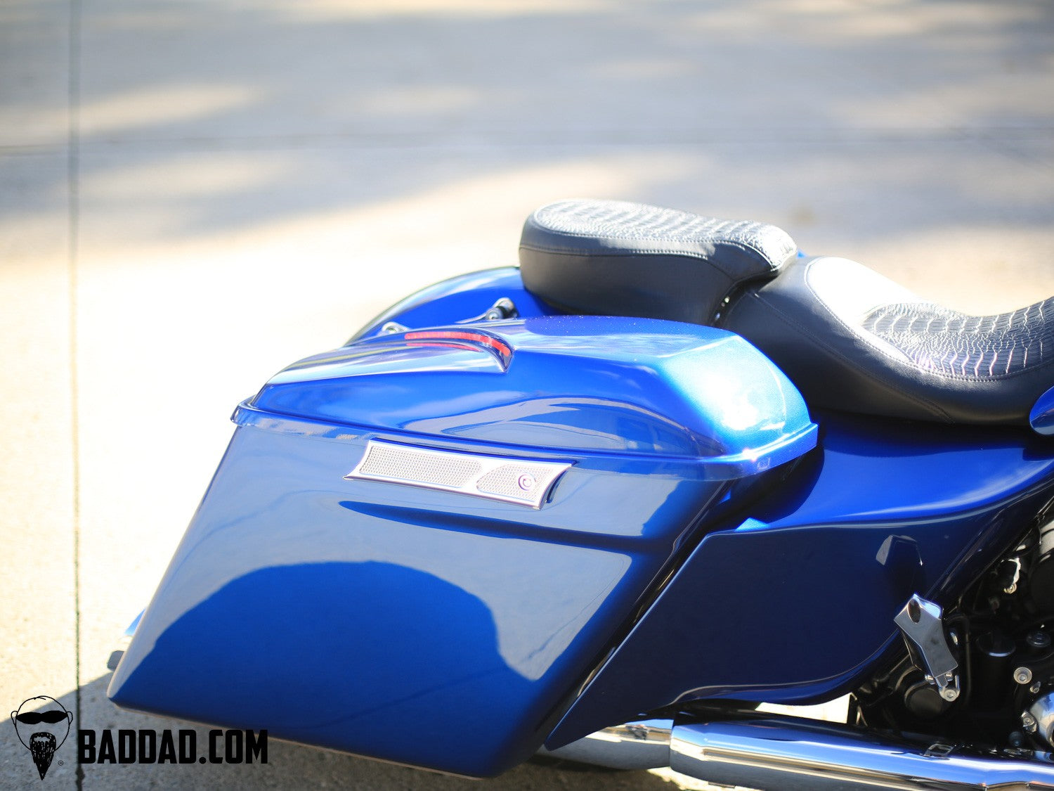 Blue custom lid installed on a Road King touring saddlebag