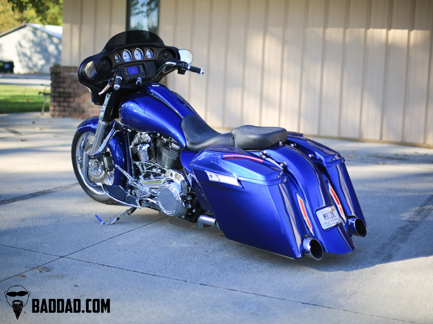 Custom Electra Glide with blue stretched saddlebag lids and LED lighting